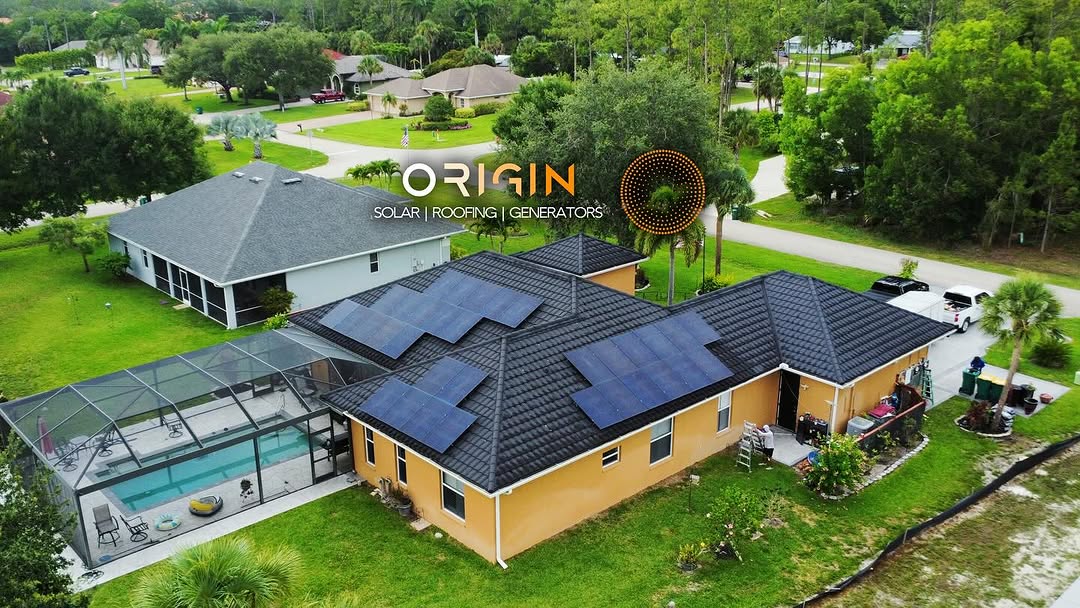 Solar arrays across a tile roof, photographed in Origin’s installation feed